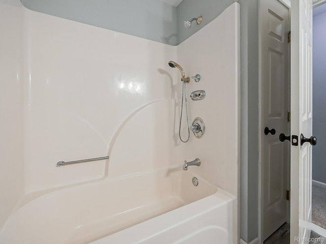 8595 Eastway Dr, White Lake, MI 48386 - full bath with bathing tub / shower combination