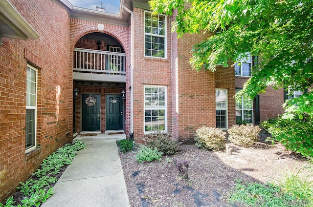 28139 Carlton Way Dr, Novi, MI 48377 - entrance to property featuring brick siding and a balcony