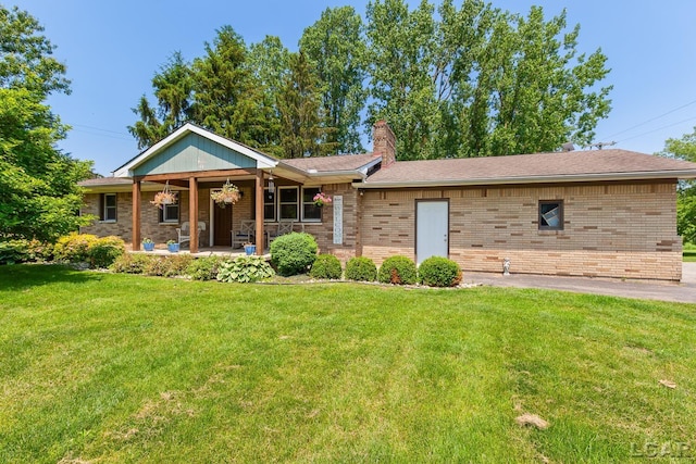 13936 Allen Rd, Clinton, MI 49236 - single story home with a porch, a front yard, brick siding, and a chimney