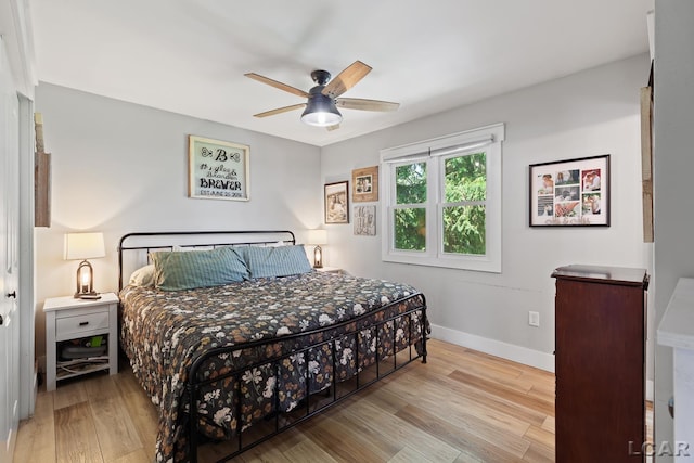 13936 Allen Rd, Clinton, MI 49236 - bedroom featuring wood finished floors and a ceiling fan