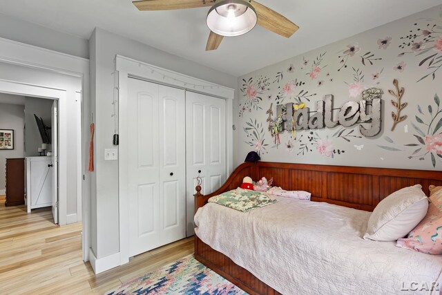 13936 Allen Rd, Clinton, MI 49236 - bedroom featuring a closet, light wood finished floors, and a ceiling fan
