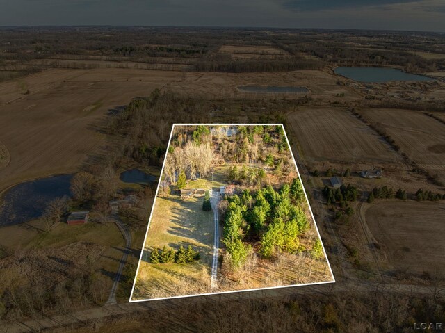 13936 Allen Rd, Clinton, MI 49236 - aerial view of sparsely populated area with a nearby body of water and property boundaries highlighted