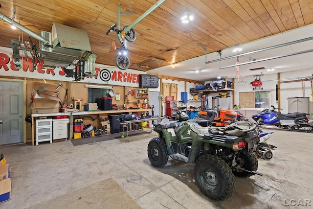 13936 Allen Rd, Clinton, MI 49236 - garage with a workshop area and wood ceiling