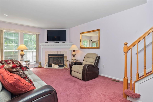 3059 Ailsa Craig, Ann Arbor, MI 48108 - living area with stairway, carpet, and a fireplace