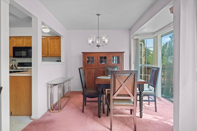 3059 Ailsa Craig, Ann Arbor, MI 48108 - dining room featuring a chandelier and light colored carpet