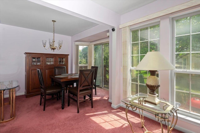 3059 Ailsa Craig, Ann Arbor, MI 48108 - carpeted dining area with a chandelier and healthy amount of natural light