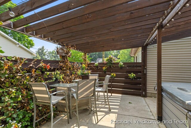1579 Geddes Ave NW, Grand Rapids, MI 49534 - view of patio / terrace featuring outdoor dining space and a pergola