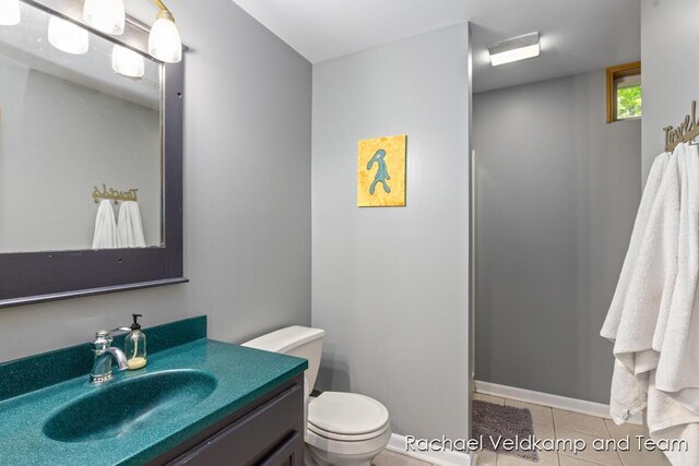 1579 Geddes Ave NW, Grand Rapids, MI 49534 - bathroom with tile patterned floors and vanity