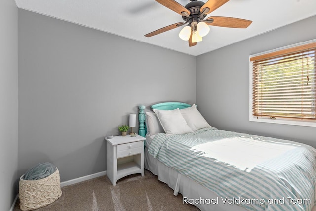 1579 Geddes Ave NW, Grand Rapids, MI 49534 - carpeted bedroom featuring baseboards and a ceiling fan