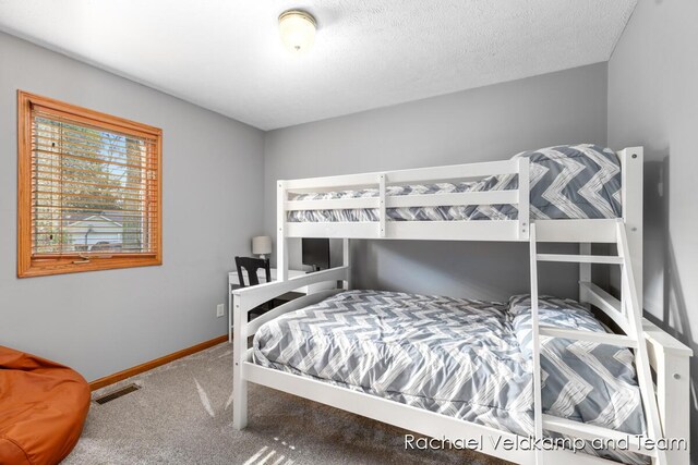 1579 Geddes Ave NW, Grand Rapids, MI 49534 - carpeted bedroom featuring baseboards