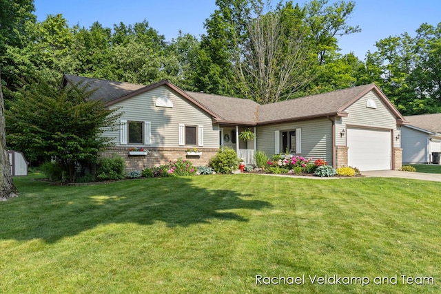1579 Geddes Ave NW, Grand Rapids, MI 49534 - single story home featuring brick siding, an attached garage, driveway, a front yard, and roof with shingles