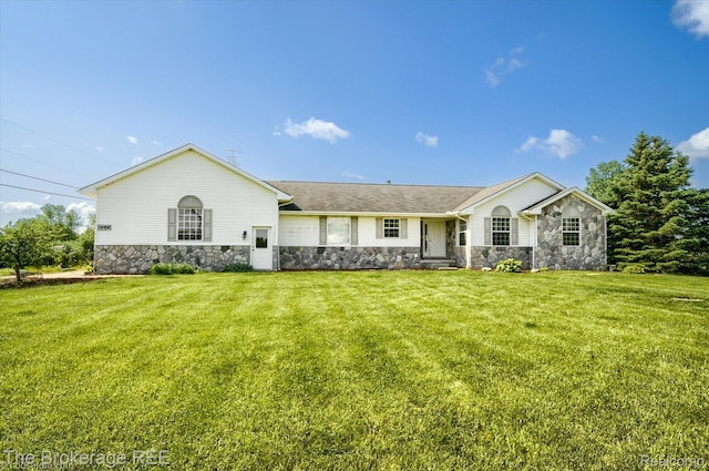 1484 E Baldwin Rd, Grand Blanc, MI 48439 - ranch-style home with stone siding and a front yard