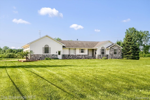 1484 E Baldwin Rd, Grand Blanc, MI 48439 - single story home with stone siding and a front yard