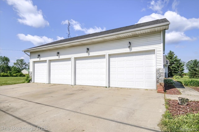 1484 E Baldwin Rd, Grand Blanc, MI 48439 - garage with concrete driveway
