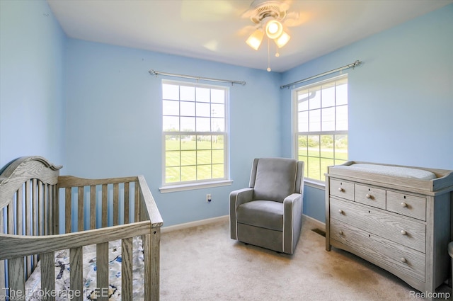 1484 E Baldwin Rd, Grand Blanc, MI 48439 - bedroom featuring light carpet and ceiling fan