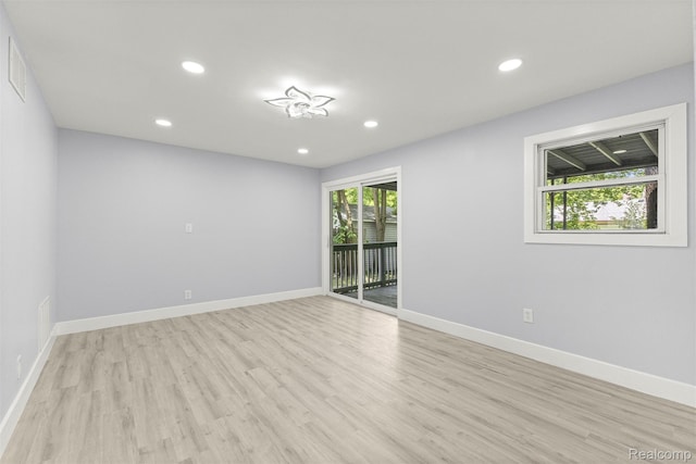 33420 Bentley Ct, Westland, MI 48186 - unfurnished room with light wood finished floors and recessed lighting