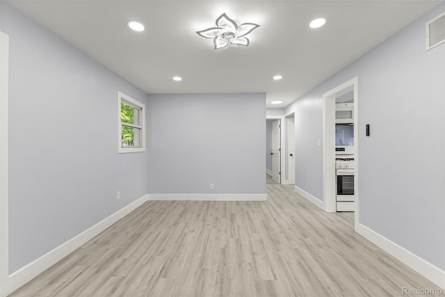 33420 Bentley Ct, Westland, MI 48186 - spare room featuring recessed lighting and light wood-style floors
