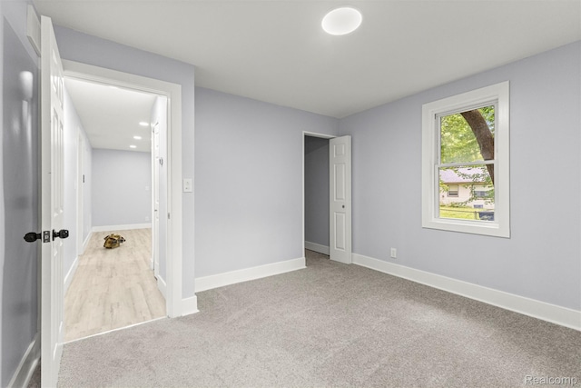 33420 Bentley Ct, Westland, MI 48186 - unfurnished bedroom with carpet flooring and baseboards