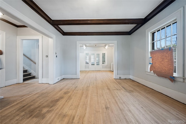 69 Massachusetts St, Highland Park, MI 48203 - unfurnished room featuring hardwood / wood-style flooring, stairs, beamed ceiling, and ornamental molding