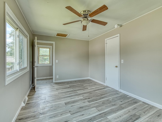 1309 Wood St, Monroe, MI 48161 - unfurnished room with ceiling fan and light wood-type flooring