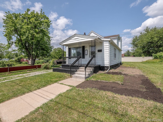 1309 Wood St, Monroe, MI 48161 - view of front of property featuring a porch