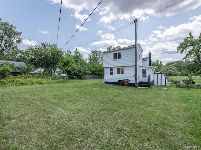 1309 Wood St, Monroe, MI 48161 - view of yard with a storage shed