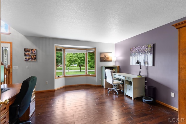 838 Stetson St, Tecumseh, MI 49286 - office space with dark wood-style floors and a textured ceiling
