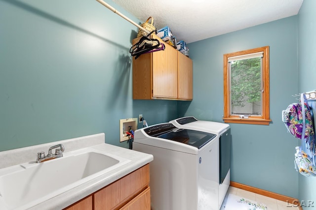 838 Stetson St, Tecumseh, MI 49286 - washroom featuring cabinet space and independent washer and dryer