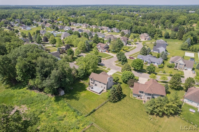 838 Stetson St, Tecumseh, MI 49286 - aerial view of residential area with a heavily wooded area