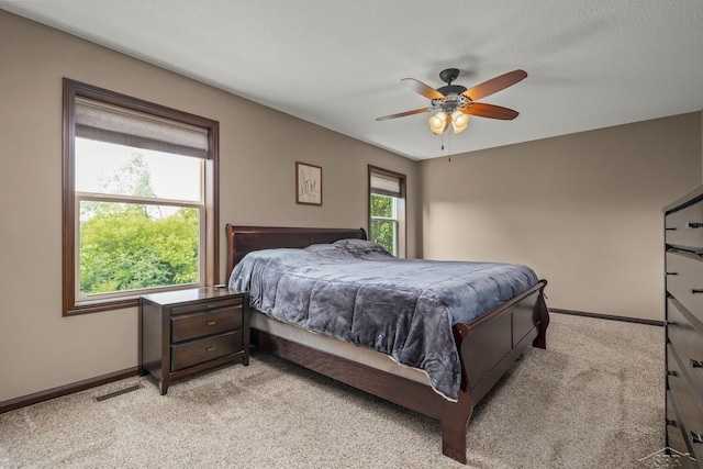 11619 Saddlebrook Cir, Freeland, MI 48623 - bedroom featuring light carpet and ceiling fan