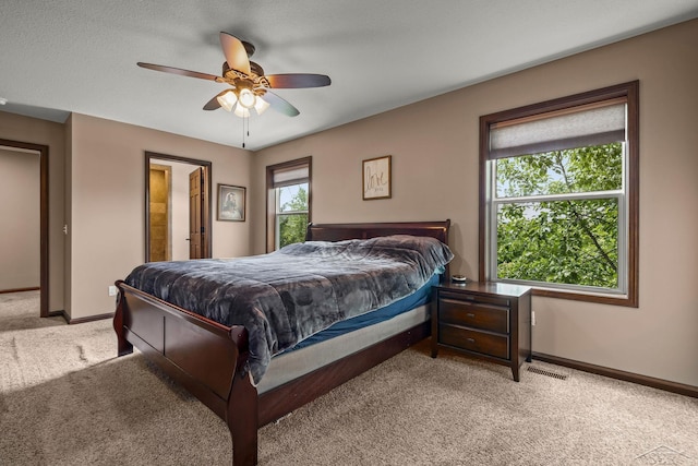 11619 Saddlebrook Cir, Freeland, MI 48623 - bedroom with light colored carpet and ceiling fan