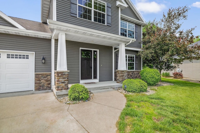 11619 Saddlebrook Cir, Freeland, MI 48623 - entrance to property featuring stone siding, a porch, a yard, and an attached garage