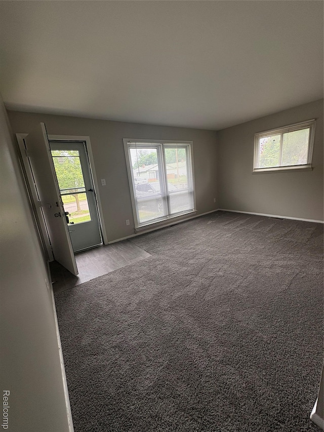 565 Wyoming Ave, Pontiac, MI 48341 - carpeted spare room featuring healthy amount of natural light