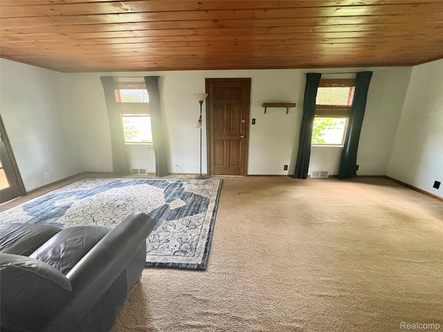 7073 N Linden Rd, Mount Morris, MI 48458 - living area with wooden ceiling, healthy amount of natural light, and carpet