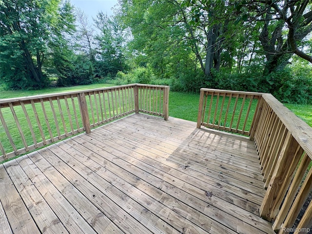 7073 N Linden Rd, Mount Morris, MI 48458 - wooden terrace with a lawn