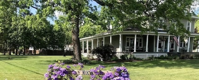 307 N Jefferson St SE, Lowell, MI 49331 - view of property's community with a lawn