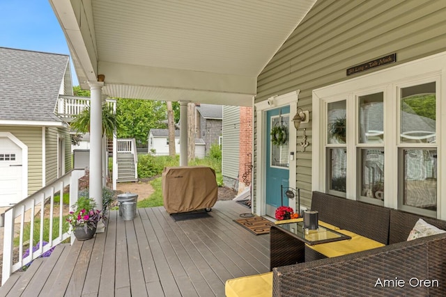 307 N Jefferson St SE, Lowell, MI 49331 - wooden deck with grilling area and stairs