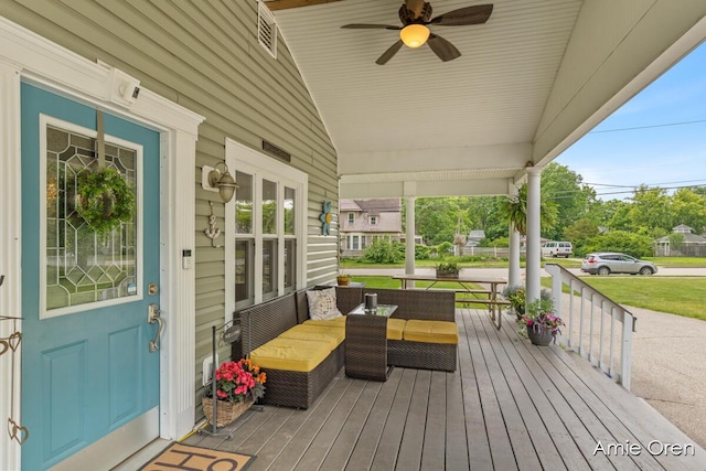 307 N Jefferson St SE, Lowell, MI 49331 - wooden porch with a ceiling fan