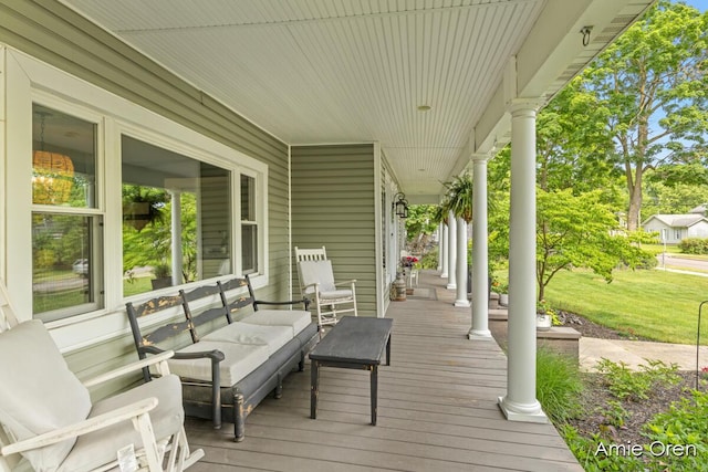 307 N Jefferson St SE, Lowell, MI 49331 - porch featuring a yard