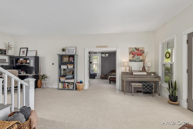 307 N Jefferson St SE, Lowell, MI 49331 - carpeted living room with baseboards