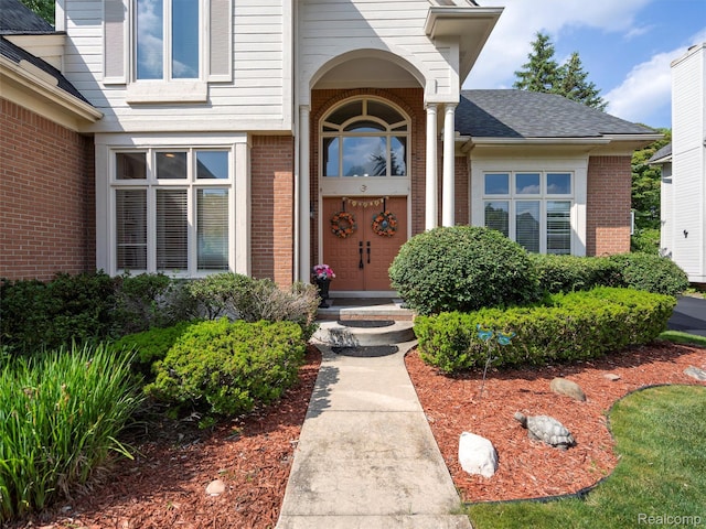 7304 Colchester Ln, West Bloomfield, MI 48322 - entrance to property with brick siding