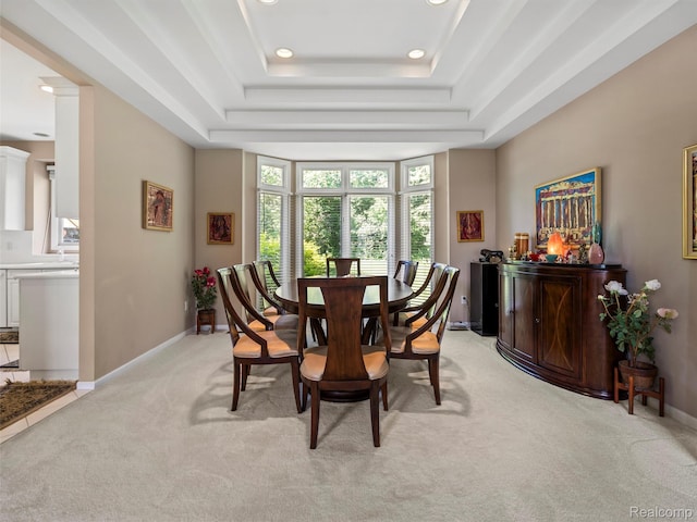 7304 Colchester Ln, West Bloomfield, MI 48322 - dining room with light colored carpet, a tray ceiling, and recessed lighting