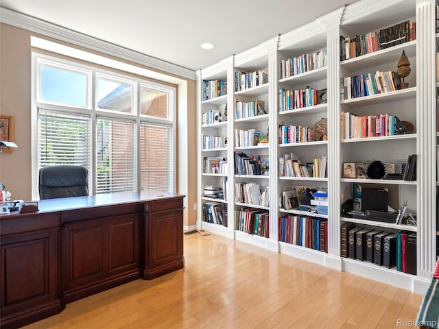 7304 Colchester Ln, West Bloomfield, MI 48322 - office area featuring light wood-type flooring and crown molding