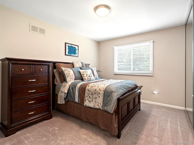 7304 Colchester Ln, West Bloomfield, MI 48322 - bedroom featuring light colored carpet and baseboards