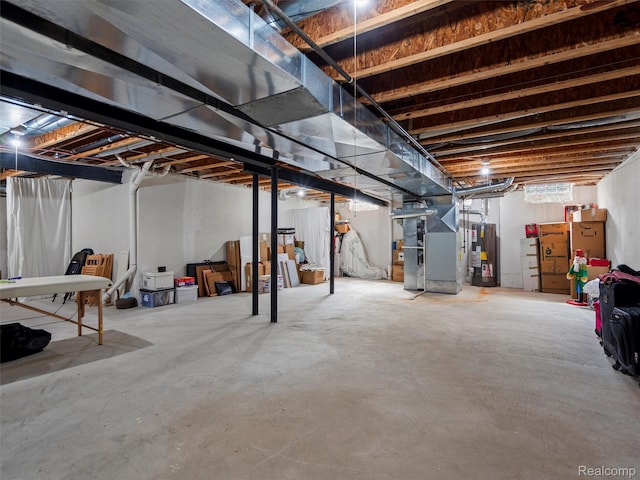 7304 Colchester Ln, West Bloomfield, MI 48322 - basement with heating unit and water heater