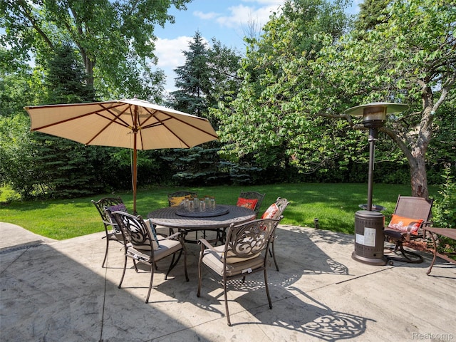 7304 Colchester Ln, West Bloomfield, MI 48322 - view of patio featuring outdoor dining space and view of scattered trees