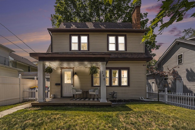 1248 Fisk Rd SE, Grand Rapids, MI 49506 - view of front of property with covered porch and a chimney