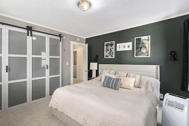 1248 Fisk Rd SE, Grand Rapids, MI 49506 - bedroom with carpet, a barn door, and ornamental molding