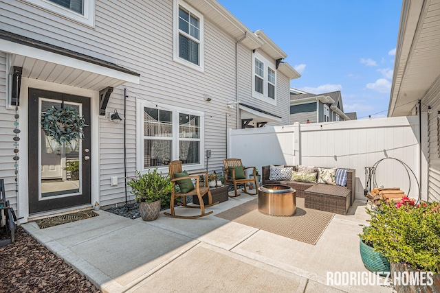 6678 S Square Ln, Rockford, MI 49341 - view of patio with an outdoor living space with a fire pit