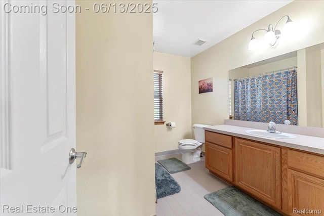 26957 Blue Heron Dr, Flat Rock, MI 48134 - bathroom featuring vanity and toilet
